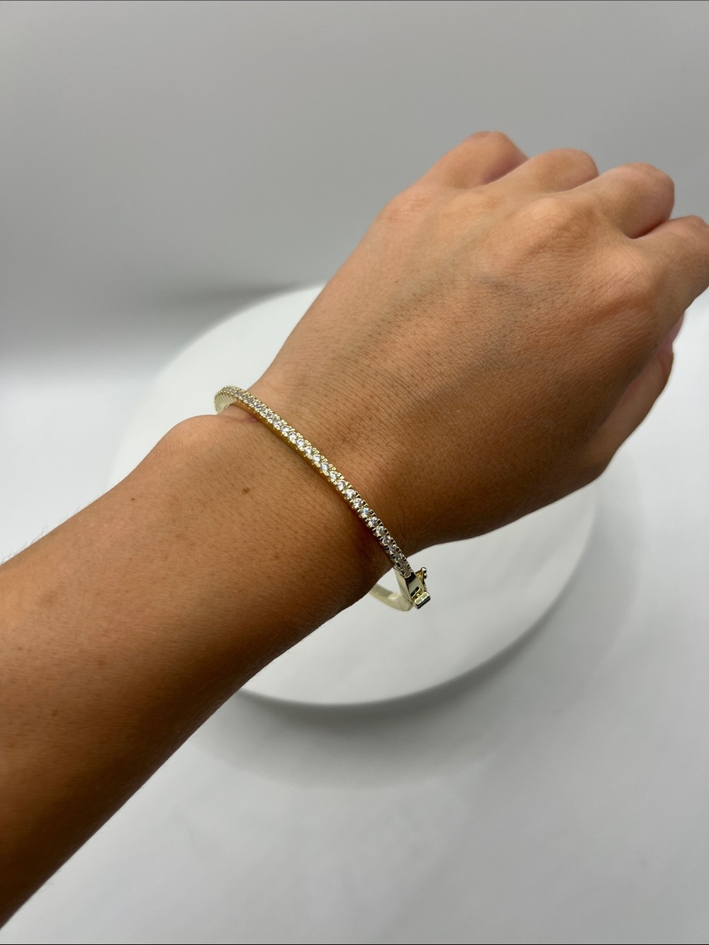 638. 18k Gold Plated Crystal Tennis Bangle Triple A Rated CZ’s. 6 1/4”